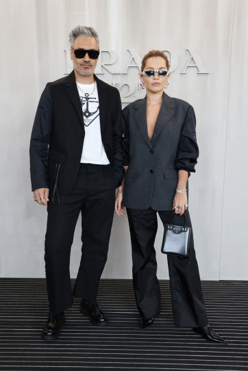 Taika Waititi and Rita Ora at the Prada show during Milan Fashion Week 2022 Getty Images for Prada