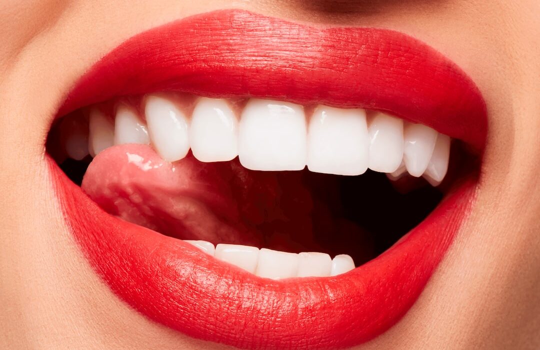 The 8 Summer Neon Orange-Red Lipsticks To Brighten Your Face