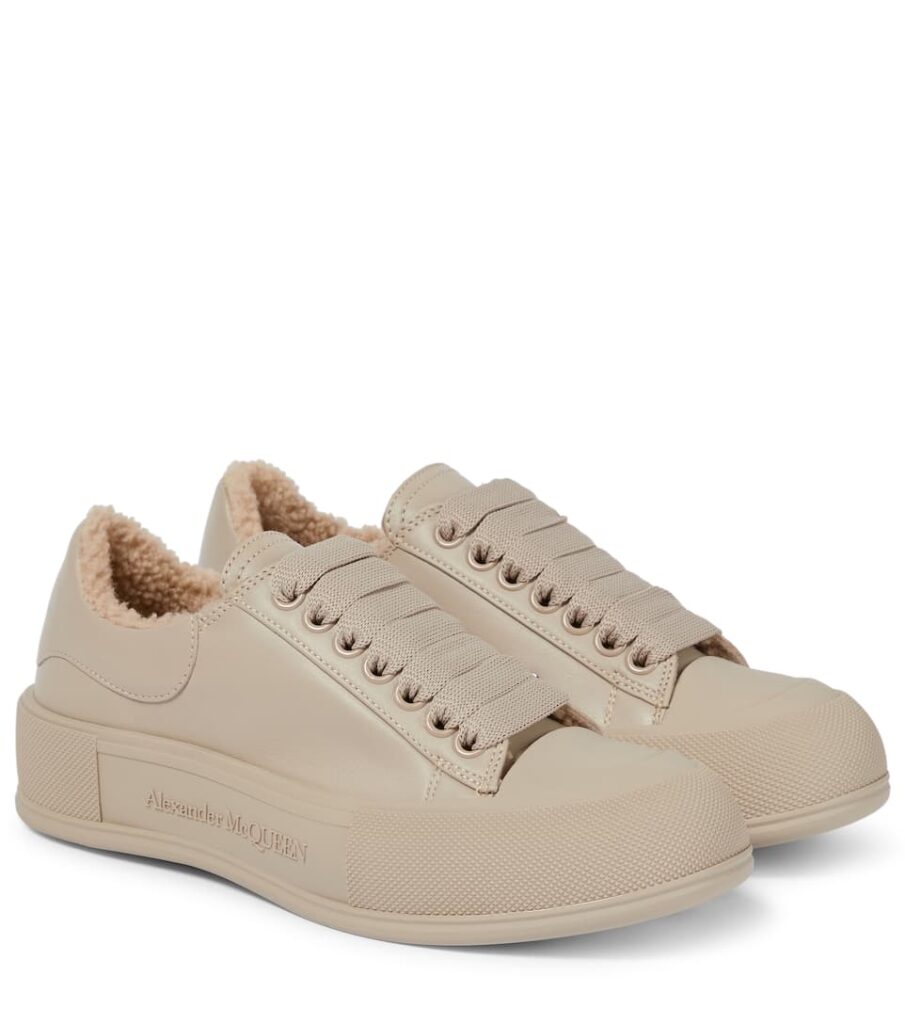 ALEXANDER MCQUEEN Shearling-trimmed leather sneakers £ 490