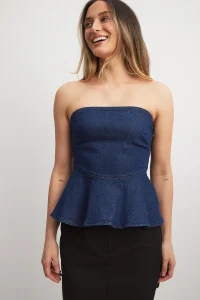 NA-KD
Peplum Denim Top
Now £22.47 Was £44.95
